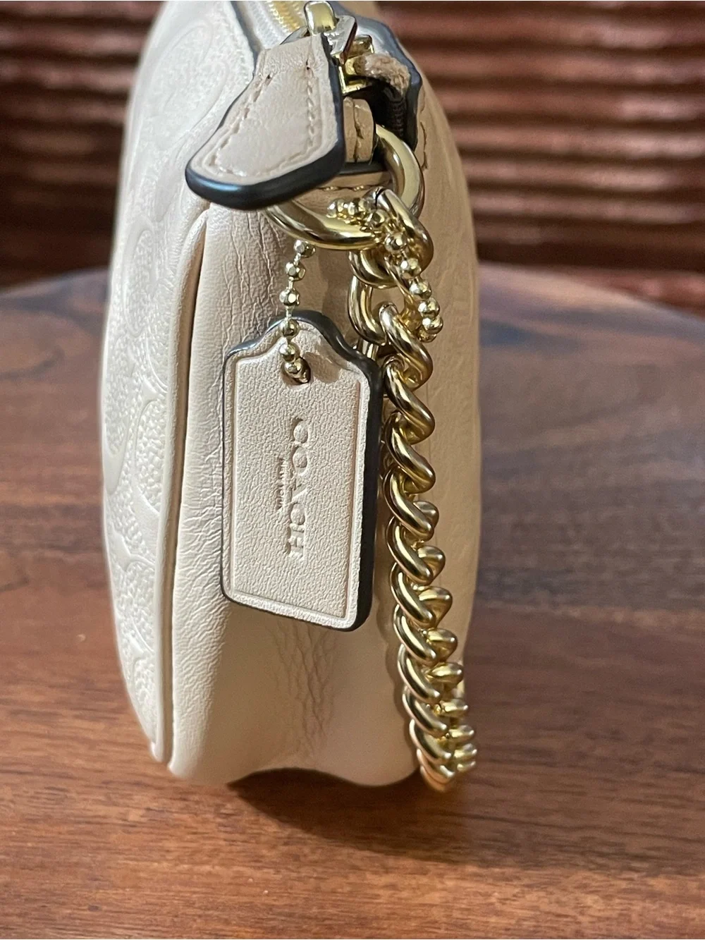 COACH Ivory Embossed Signature C Pebble Leather Large Wristlet F67567